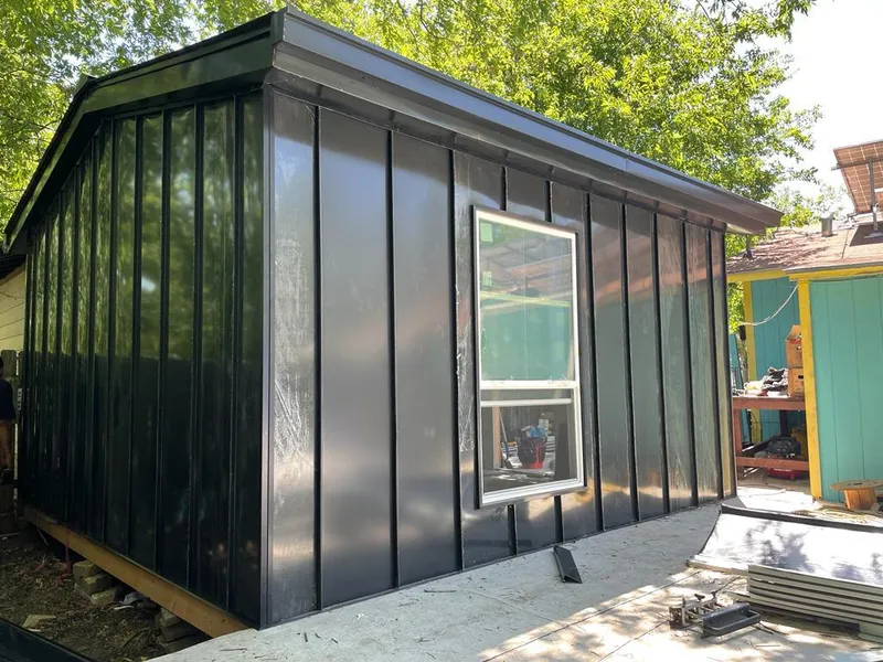 Black standing seam metal wall panels for Roof Inspection in Meredith