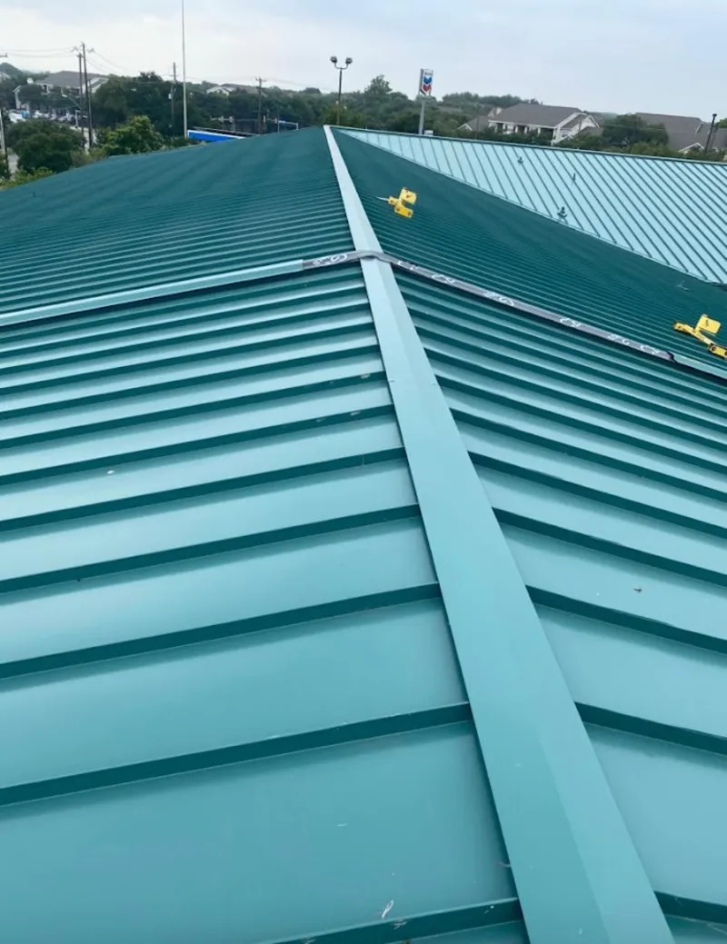 Green commercial metal roof ridge and valley for Metal Roof Repair in Meredith